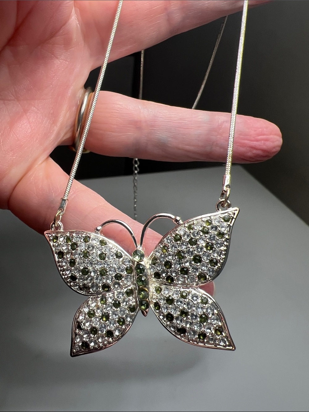Striking - Silver Butterfly Pendant Necklace with Green and Clear Stones